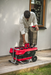 Red and Black Cramer 82V Professional 6 Slot Rapid Charging Station in use