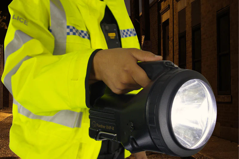 Black NightSearcher Panther XHP-X rechargeable searchlight in use