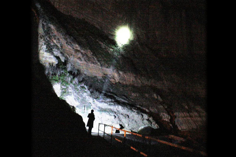 Black NightSearcher Panther XHP-X rechargeable searchlight in use